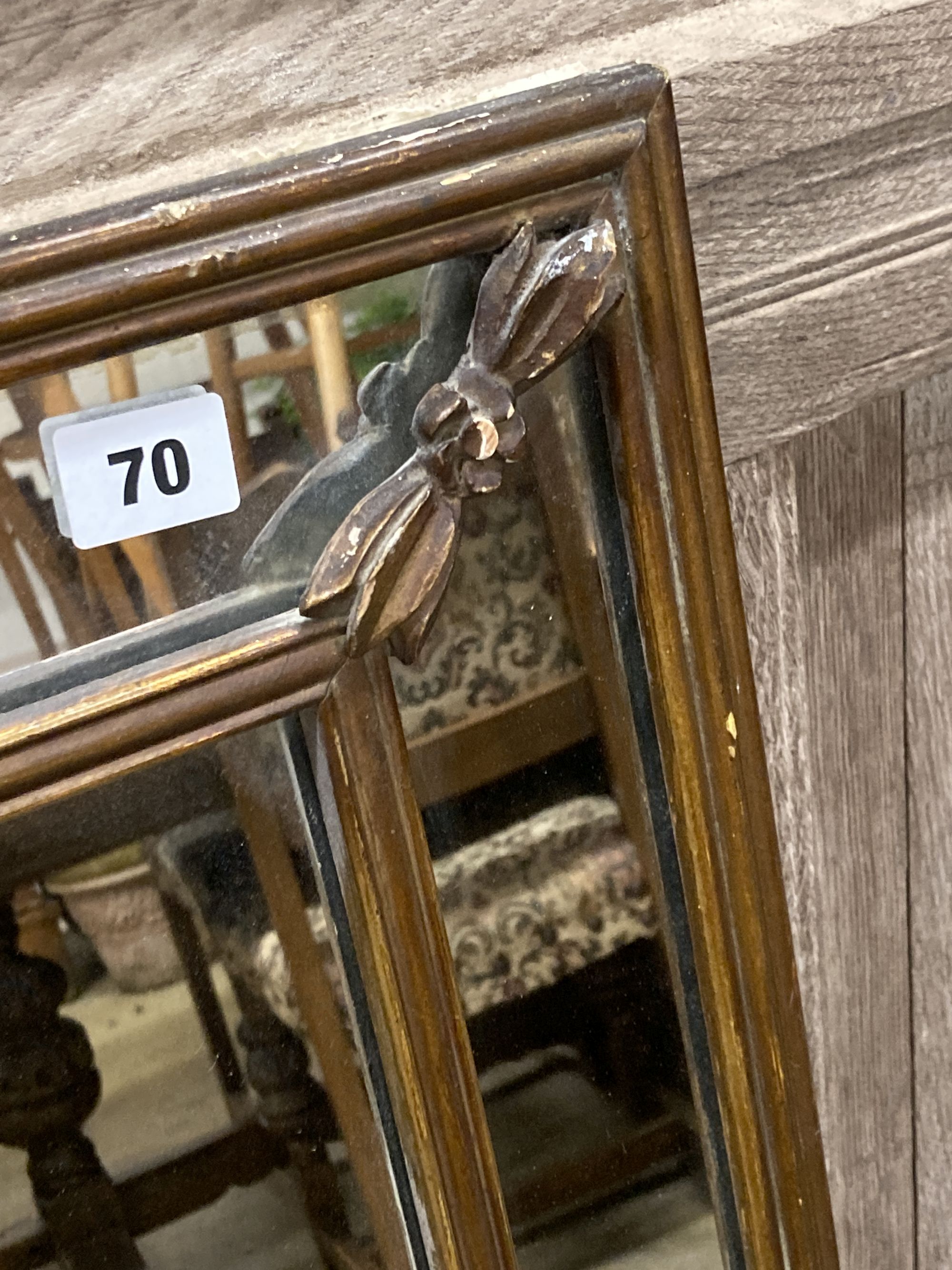 A Georgian style gilt-framed rectangular wall mirror with marginal plates, width 105cm, height 70cm
